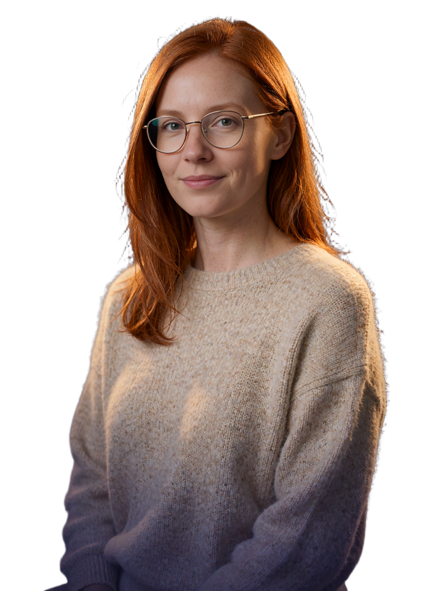 Single woman with copper-red hair and glasses in an oatmeal knit sweater on a Selunion dating profile card